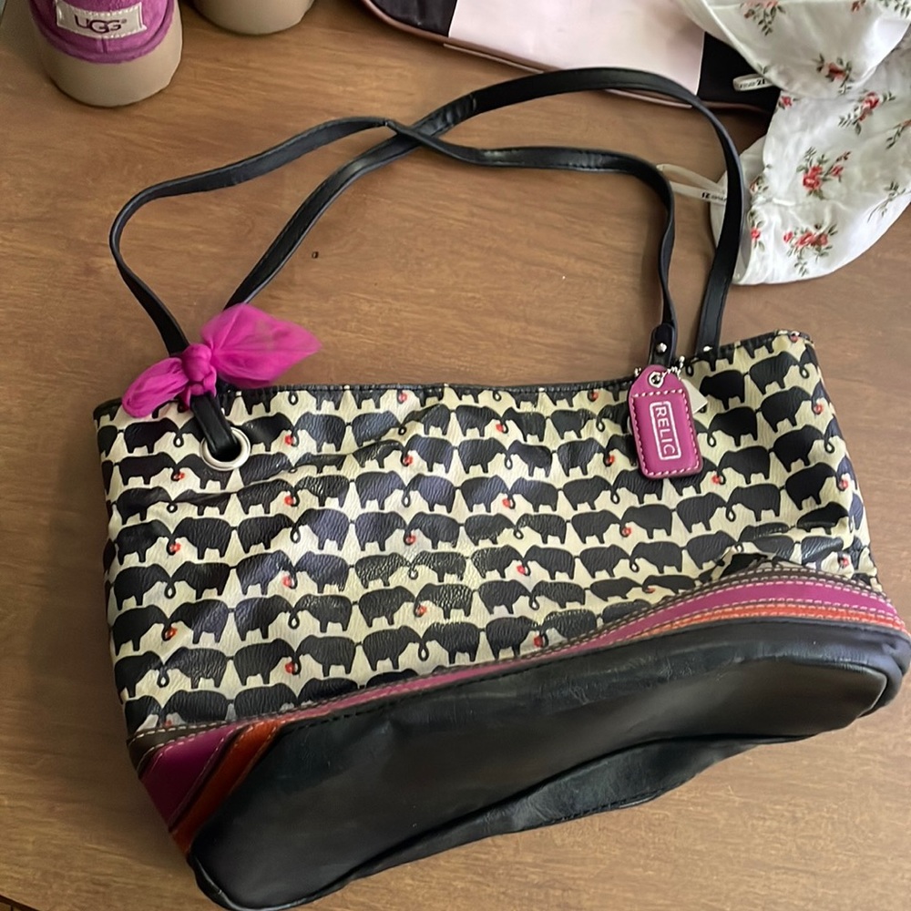 Relic tote bag with anima print gently used
